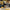 Dewalt cordless heat gunwith compatibility information for Dewalt 20v batteries on a blurred background.